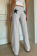 Wide-leg joggers with stars patch