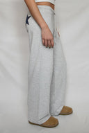 Wide-leg joggers with stars patch
