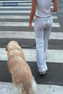 Cuffed pants with wings