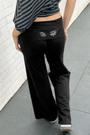 Cuffed pants with wings
