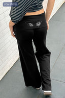 Cuffed pants with wings