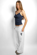 Wide-leg joggers with cross patch