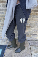 Trousers with sequin wings