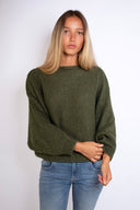 Cross-over sweater at the back